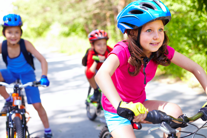 Kids bike riding at paediatric OT session